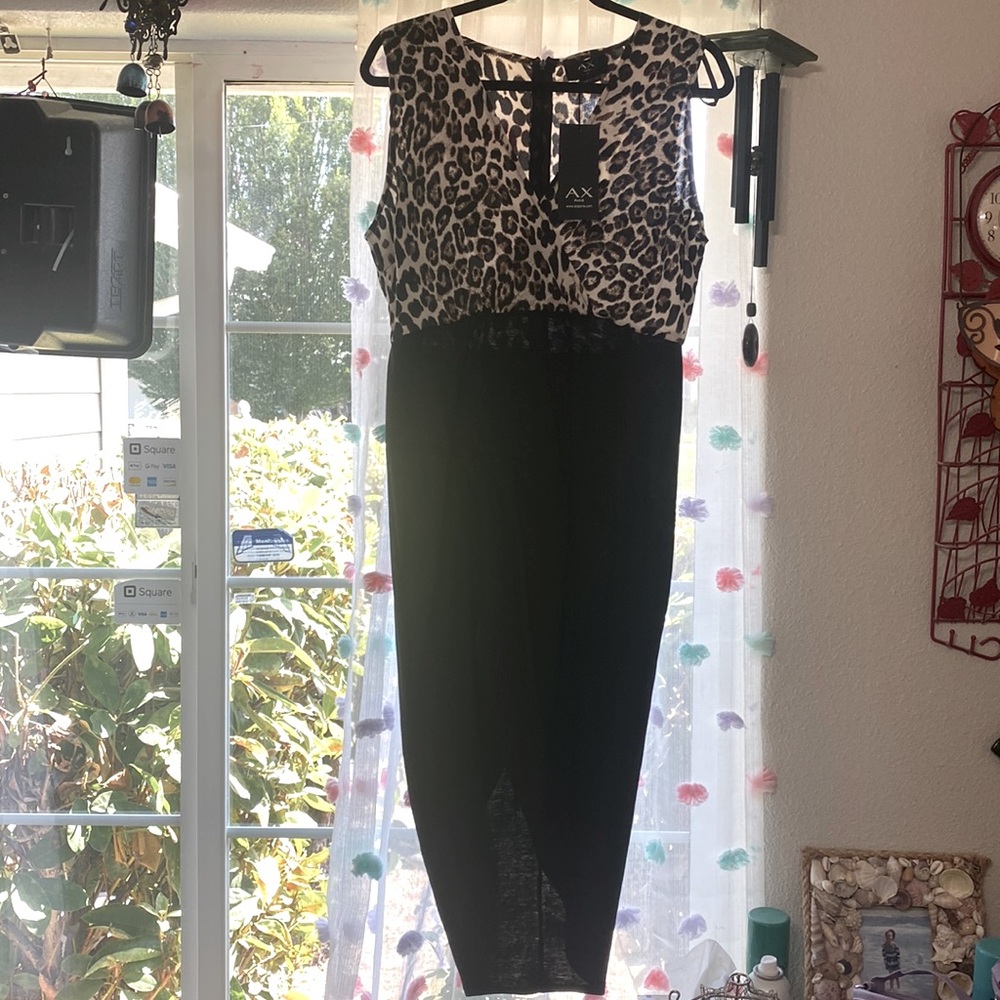 Ax MIDI dress it opens up higher in the front. Size 14